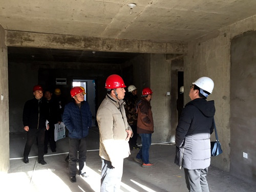 天工公司土建四部神木新村神南華府27、28#樓順利通過竣工驗收