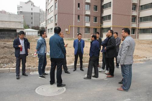 銅煤公司承建的銅煤2#小區水仙居5、6、7、8#樓順利通過竣工驗收